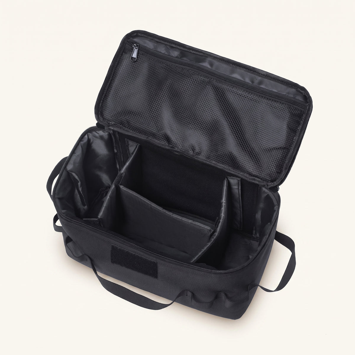 Interior of the Meoggy Grooming Kit Bag, showing the adjustable dividers and mesh zip pocket