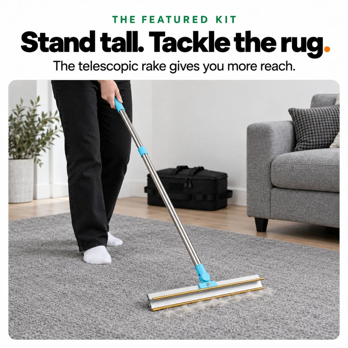 Removing pet hair from a grey rug standing up, with the kit's telescopic carpet rake