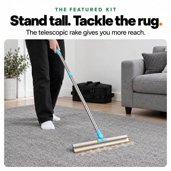 Removing pet hair from a grey rug standing up, with the kit's telescopic carpet rake