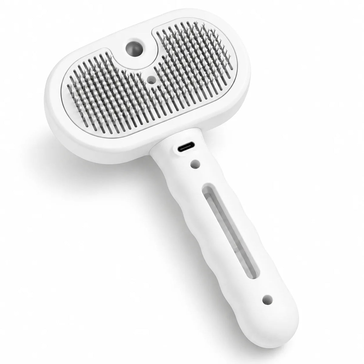 Meoggy Mist Comb detangling spray brush for cats and dogs in white, with rounded bristle tips and a water mist outlet