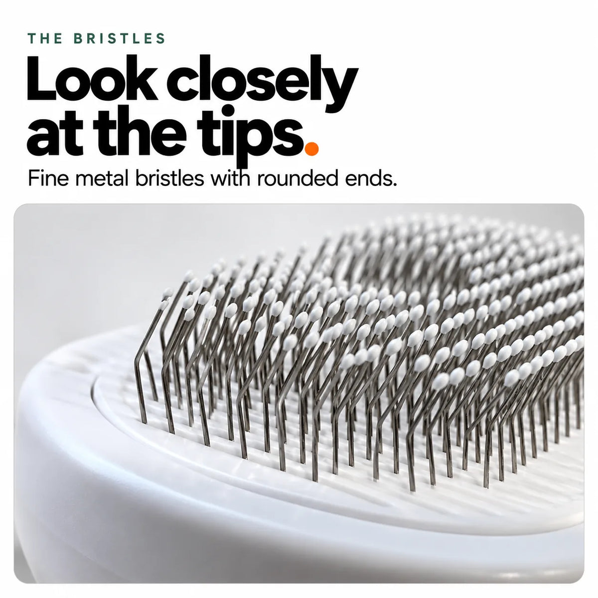 Close-up of the Mist Comb's fine metal bristles with rounded tips
