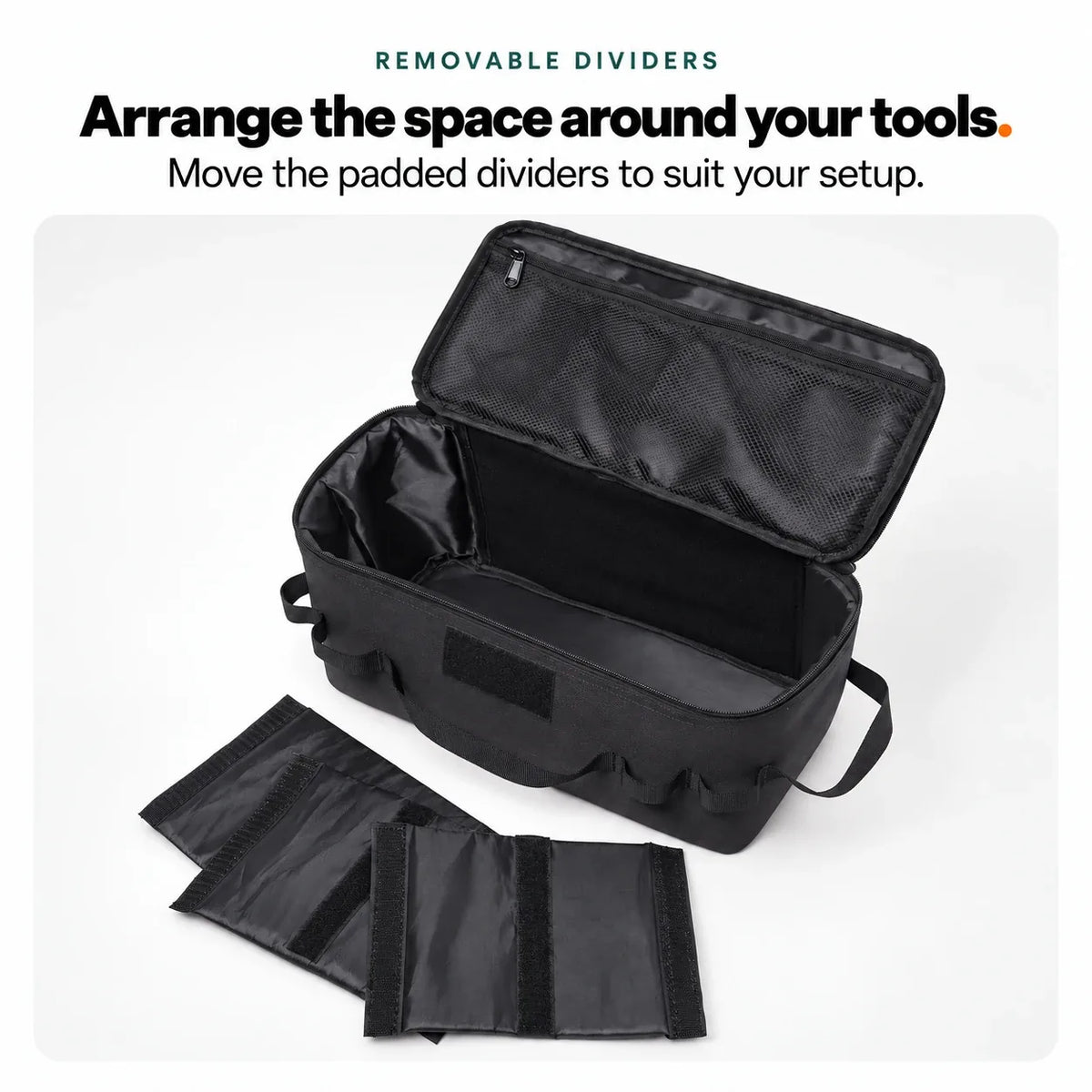The grooming kit bag's removable padded dividers laid out beside the open bag