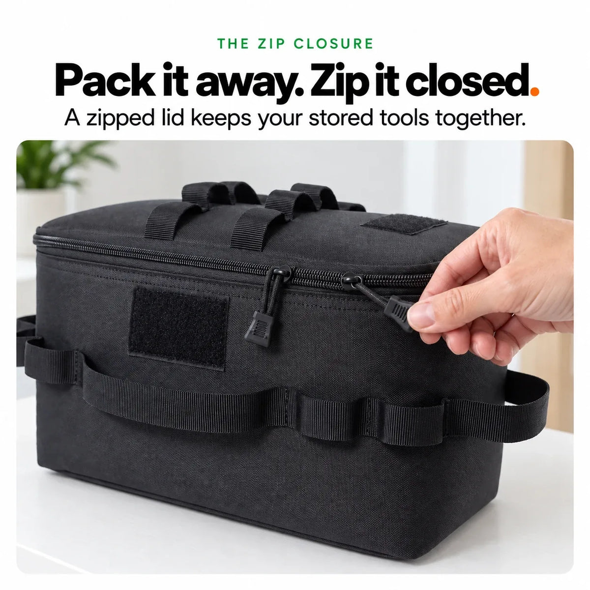 Closing the zip lid of the Meoggy grooming kit bag to keep the tools together